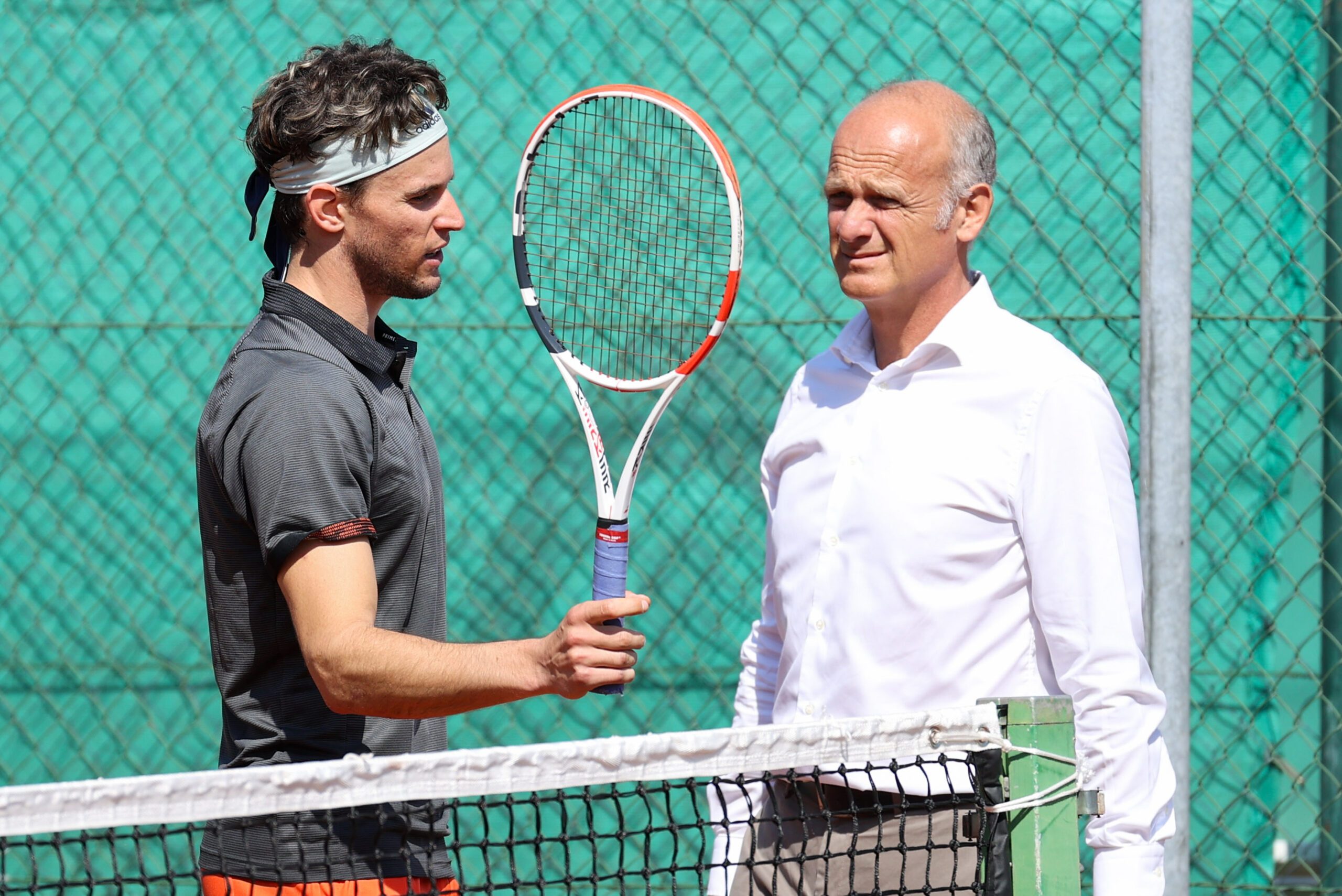 WIEN,AUSTRIA,28.APR.20 - TENNIS - ATP, training after lightening the restrictions due to the SARS-CoV-2 crisis, corona crisis. Image shows Dominic Thiem (AUT) and Manager Herwig Straka.