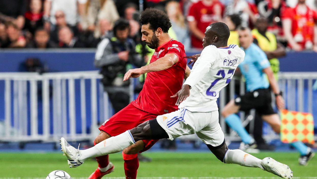SAINT DENIS,FRANCE,28.MAY.22 - SOCCER - UEFA Champions League, final, Liverpool FC vs Real Madrid CF. Image shows Mohamed Salah (Liverpool) and Ferland Mendy (Madrid).